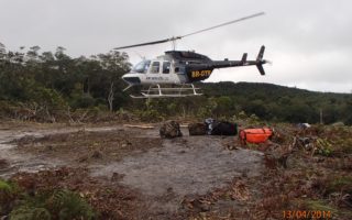 an image of a helicopter landing during an expedition